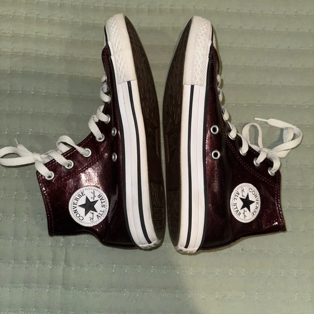 Shimmer black cherry high top Chuck Taylor converse big kids size 3. GUC